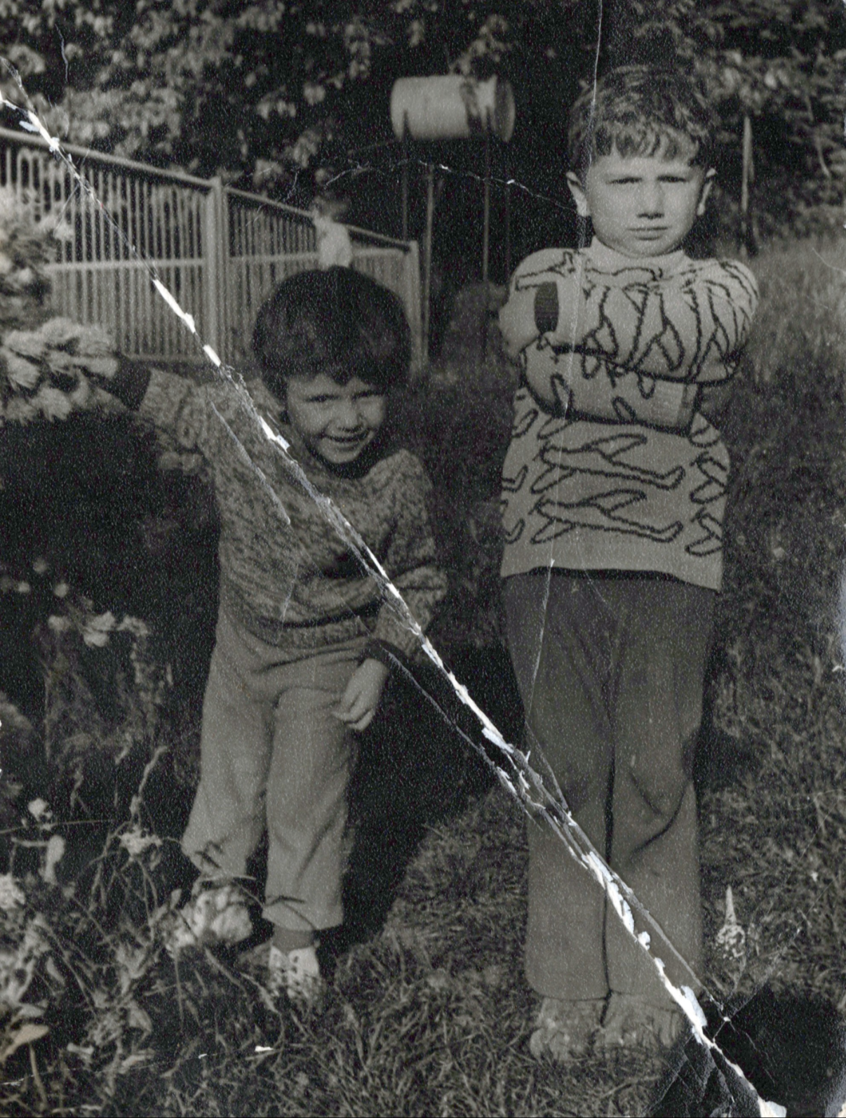 Old damaged family portrait before AI photo restoration